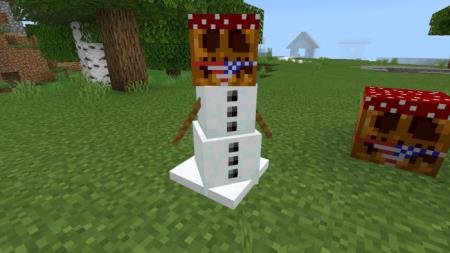 Снеговик с головой в виде тыквы, одетой как Рикардо Милос