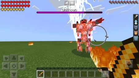 Игрок атакует босса в виде робота из командных блоков молниями