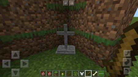 Надгробный крест на углу скалы
