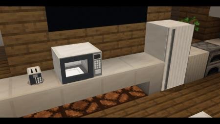 Тостер, микроволновка и холодильник на кухне