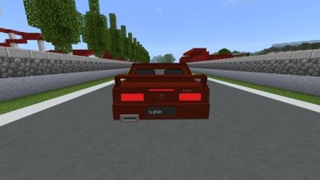 Вид сзади на красную Toyota Supra MK4