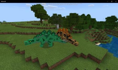 Зелёный и оранжевый стегозавры на равнине