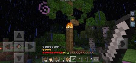 Игрок смотрит на горящий верх ствола дерева