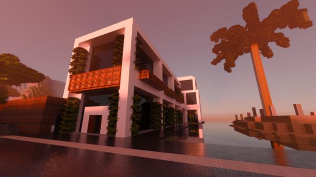 Двухэтажный домик и пальма за окном