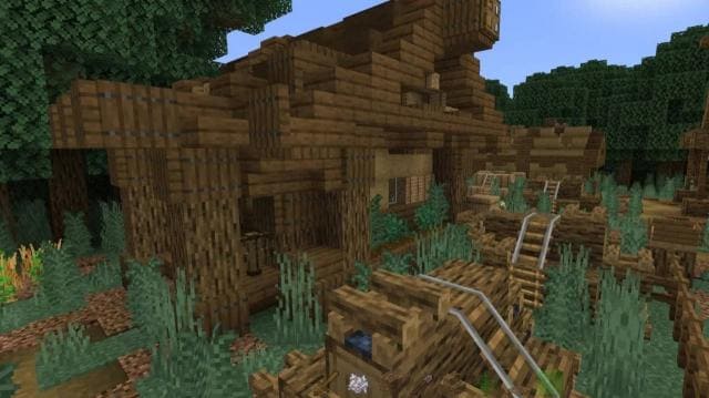 Деревянный домик с железными путями