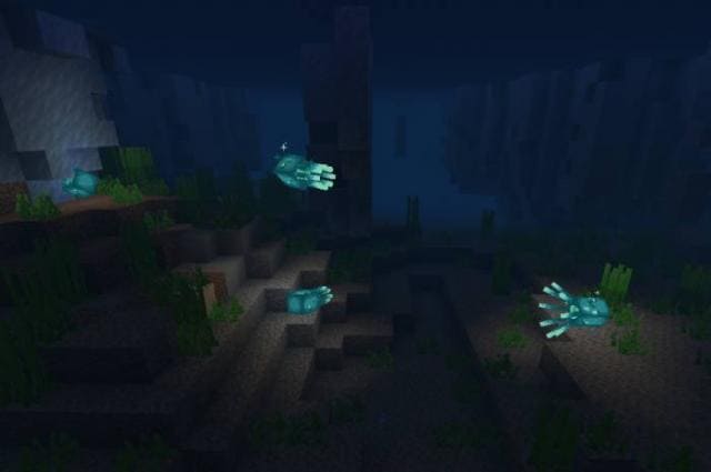 Светящиеся кальмары в воде