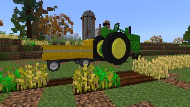 Зеленый трактор с тележкой