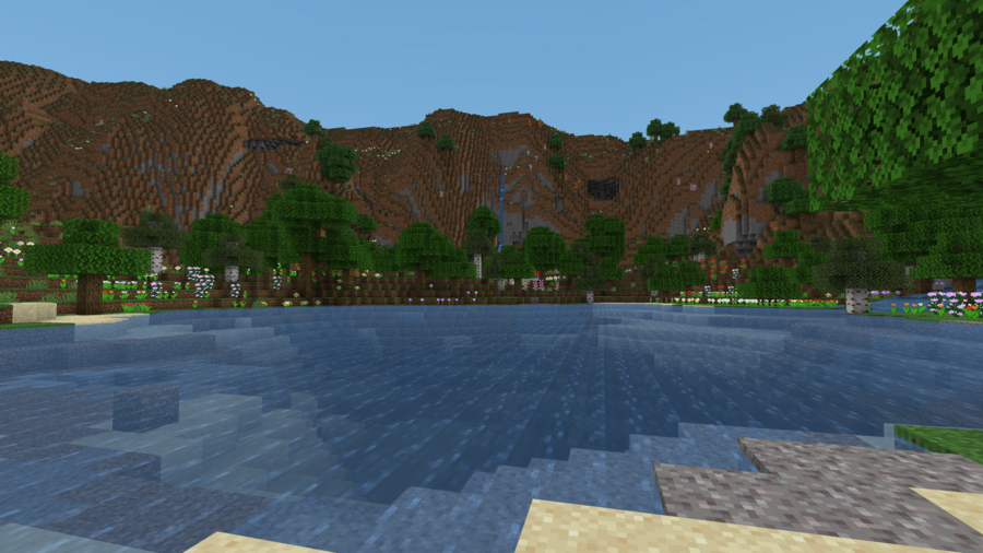 Вид на озеро и горы с поляны на дне