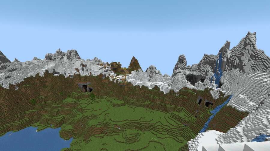 Вид на летнюю долину среди снежных гор