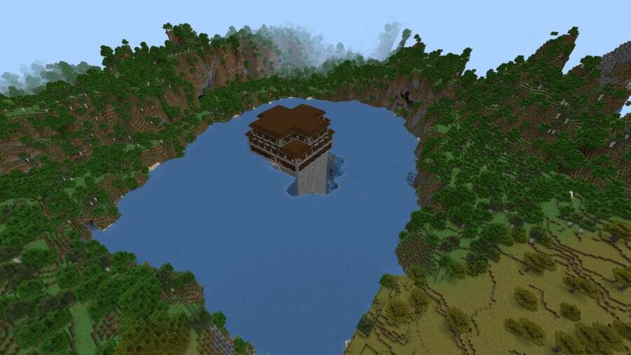 Особняк стоит по середине большого озера среди лесов