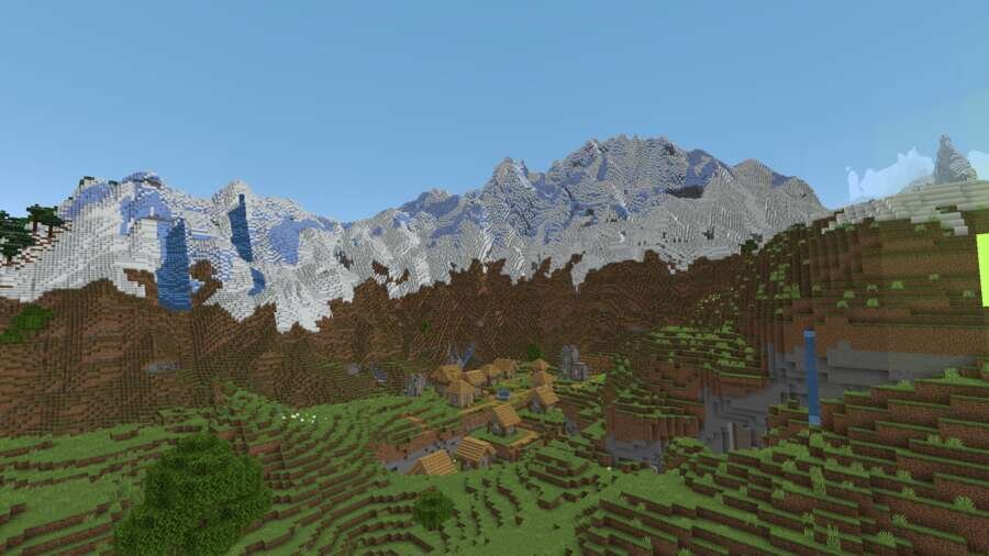 Вид на деревушку и горы сверху