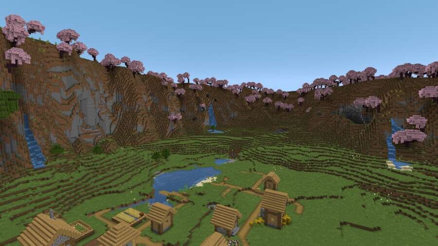 Горы с долиной и деревней спереди