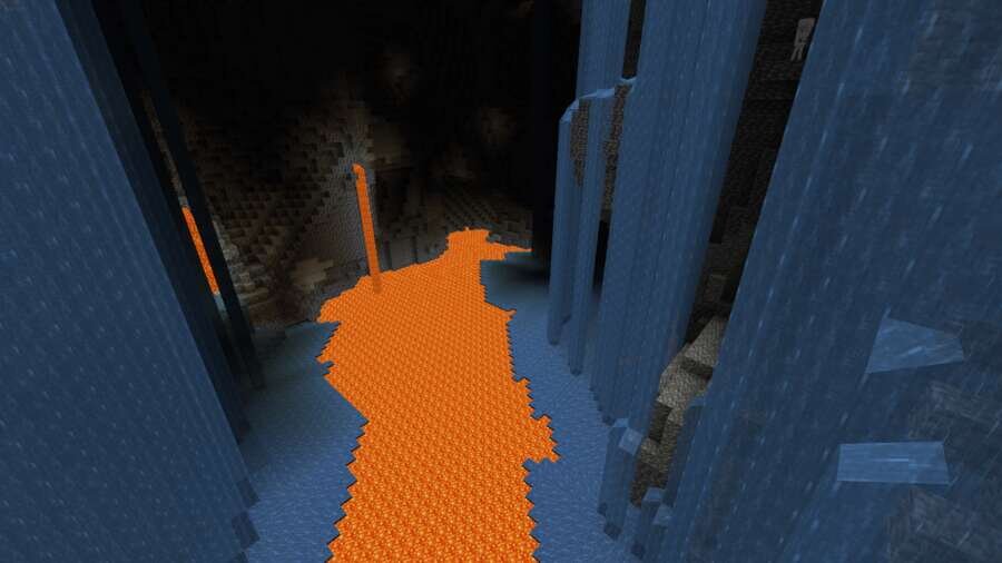 Лавовое озеро с водопадами в пещере