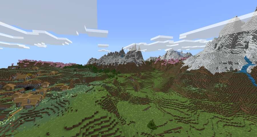 Вид на горы и деревушку на фоне биома сакуры