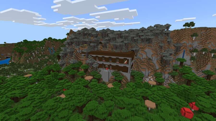 Особняк на фоне горы и бледного сада