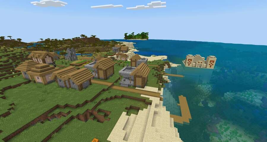 Вид на деревушку и пустынный храм на фоне моря