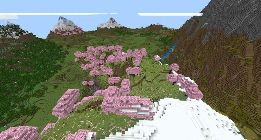 Биом сакуры и мощные горы на фоне бескрайнего неба