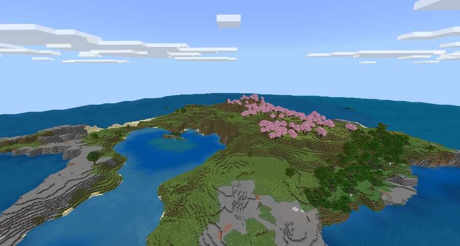 Вид на островок посреди синего неба и океана