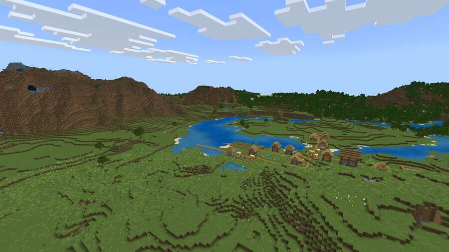 Как выглядит большая деревушка на фоне гор