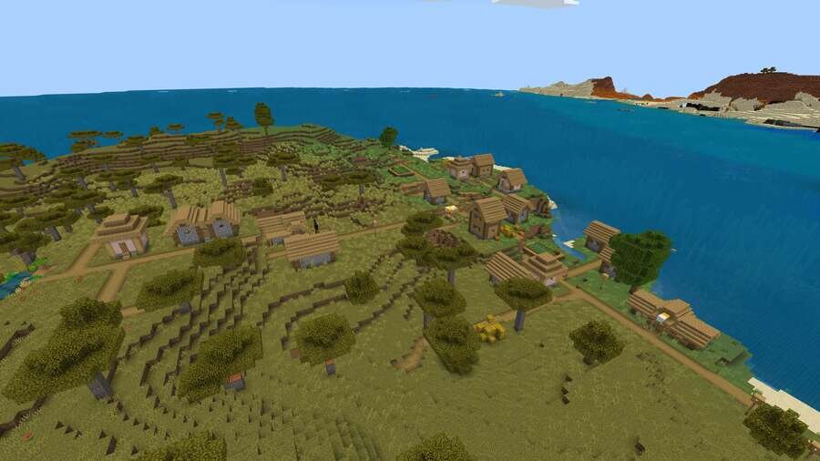 Деревня с обычных оформлением на фоне зеленой травы