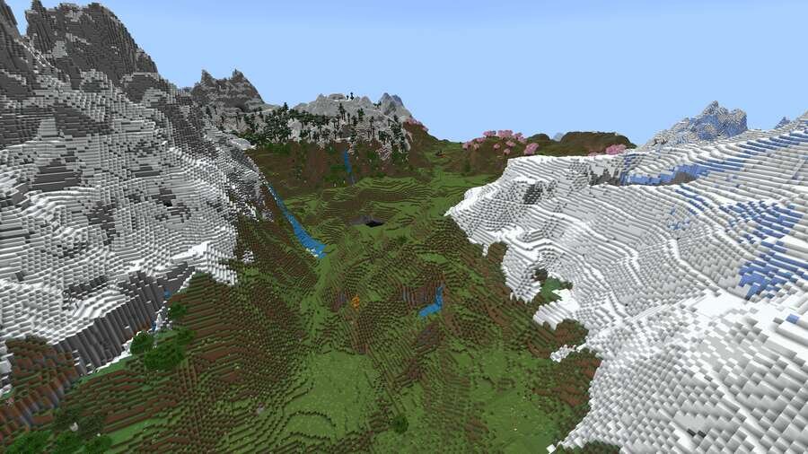 Вид на горную долину со снежными горами сверху 2